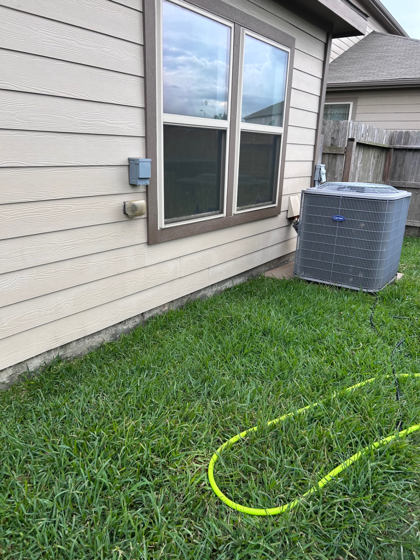 House siding clean after soft wash house washing in Cypress TX